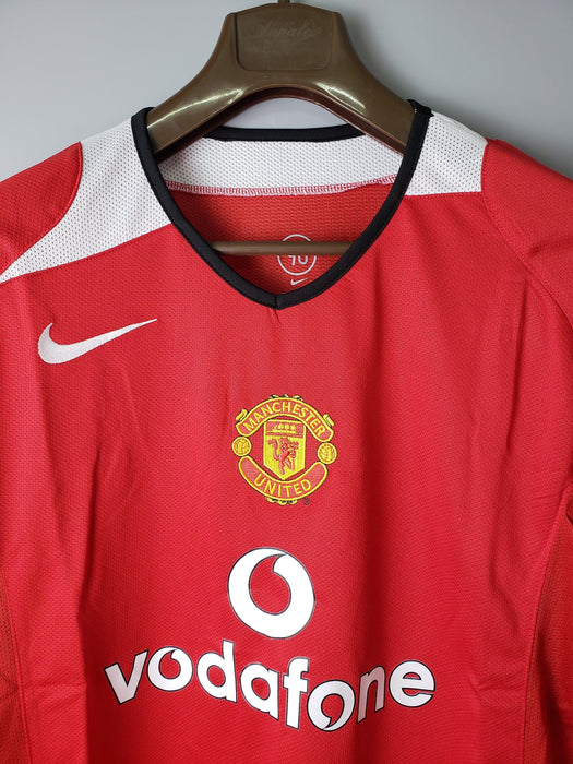 Manchester United 2005 Retro
Local Manga larga